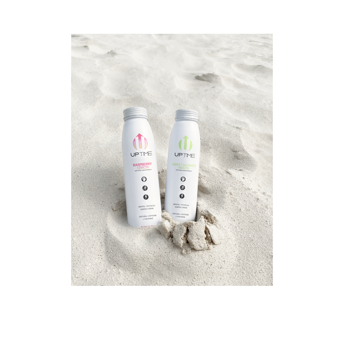 bottles of uptime raspberry lemon and uptime sweet summer melon sitting in the sand Image2