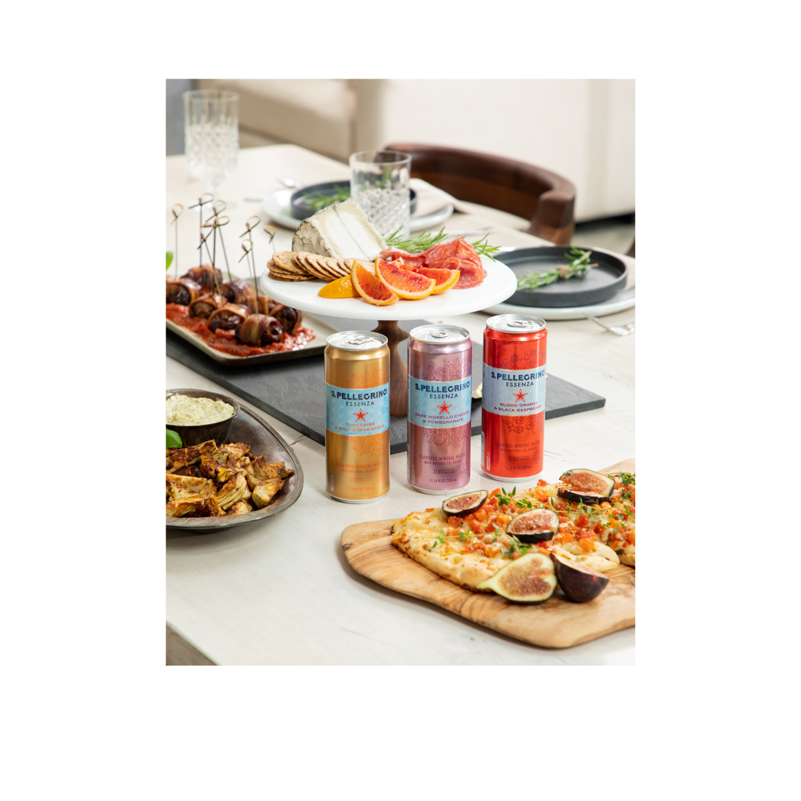 lifestyle - s.pellegrino essenza blood orange & black raspberry sparkling natural mineral water - slim cans Image3