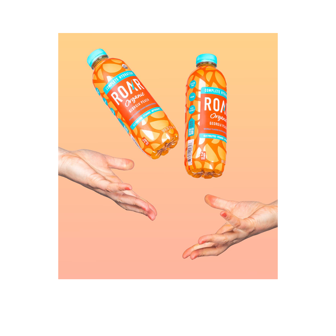 hands throwing bottles of roar organic georgia peach drinks Image2