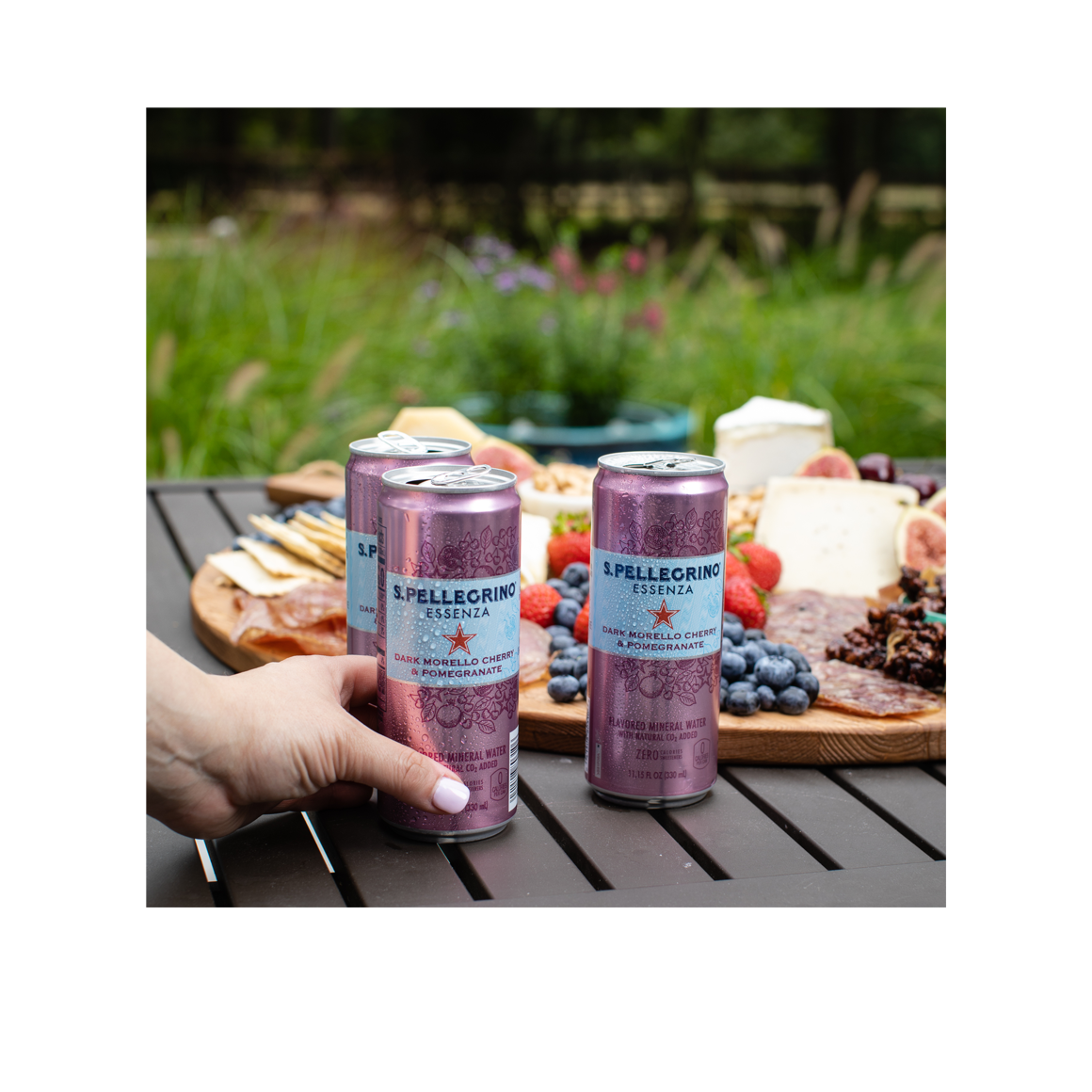 lifestyle - s.pellegrino essenza dark cherry morello & pomegranate sparkling natural mineral water - slim cans Image3
