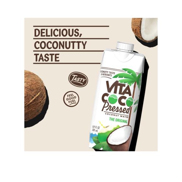delicious coconutty taste vita coco pressed coconut water with halved and whole coconuts Image1