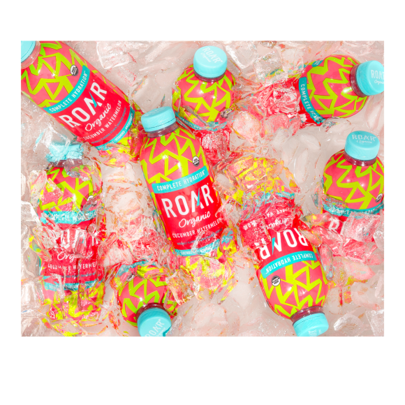 bottles of roar organic cucumber watermelon drinks floating in ice and water Image2