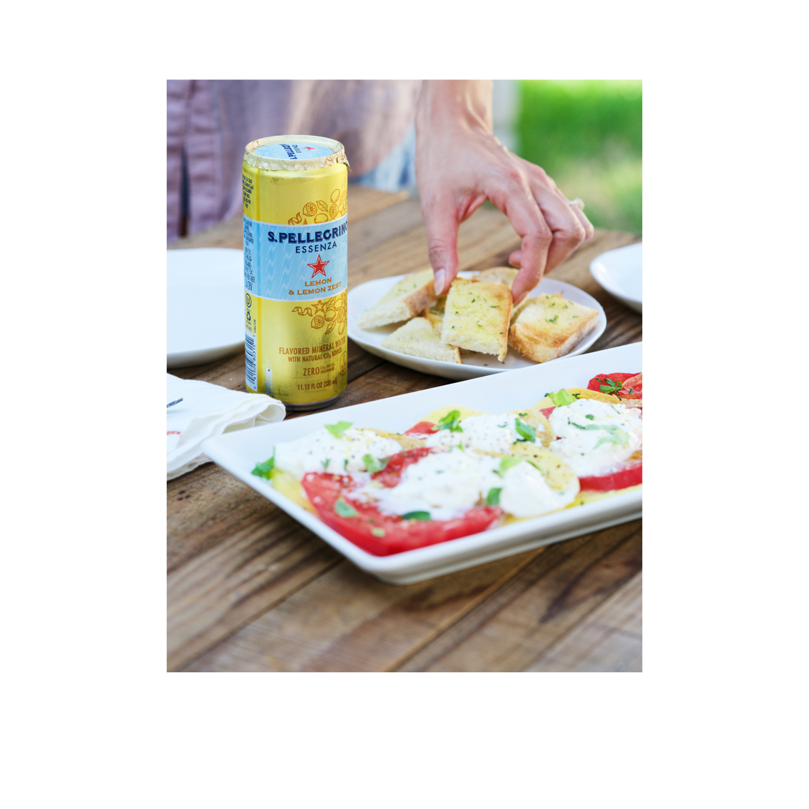 lifestyle - s.pellegrino essenza lemon zest sparkling natural mineral water - slim cans Image3