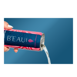 hand pouring a can of raspberry hibiscus beau collagen water